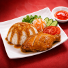 Cơm Đùi Gà Tươi Sốt Mật Ong tại Mì Cay Quốc Dân với cơm trắng, đùi gà mềm ngọt phủ sốt mật ong óng nhẹ